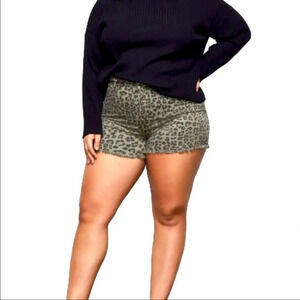 Good American leopard denim shorts in olive green
